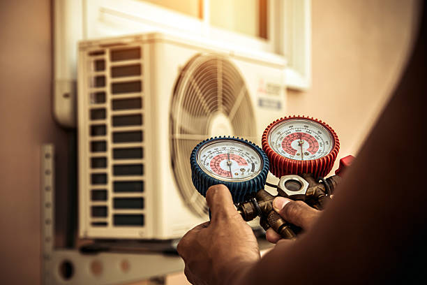 Professional Air Conditioning Service technician working in Hurricane, UT